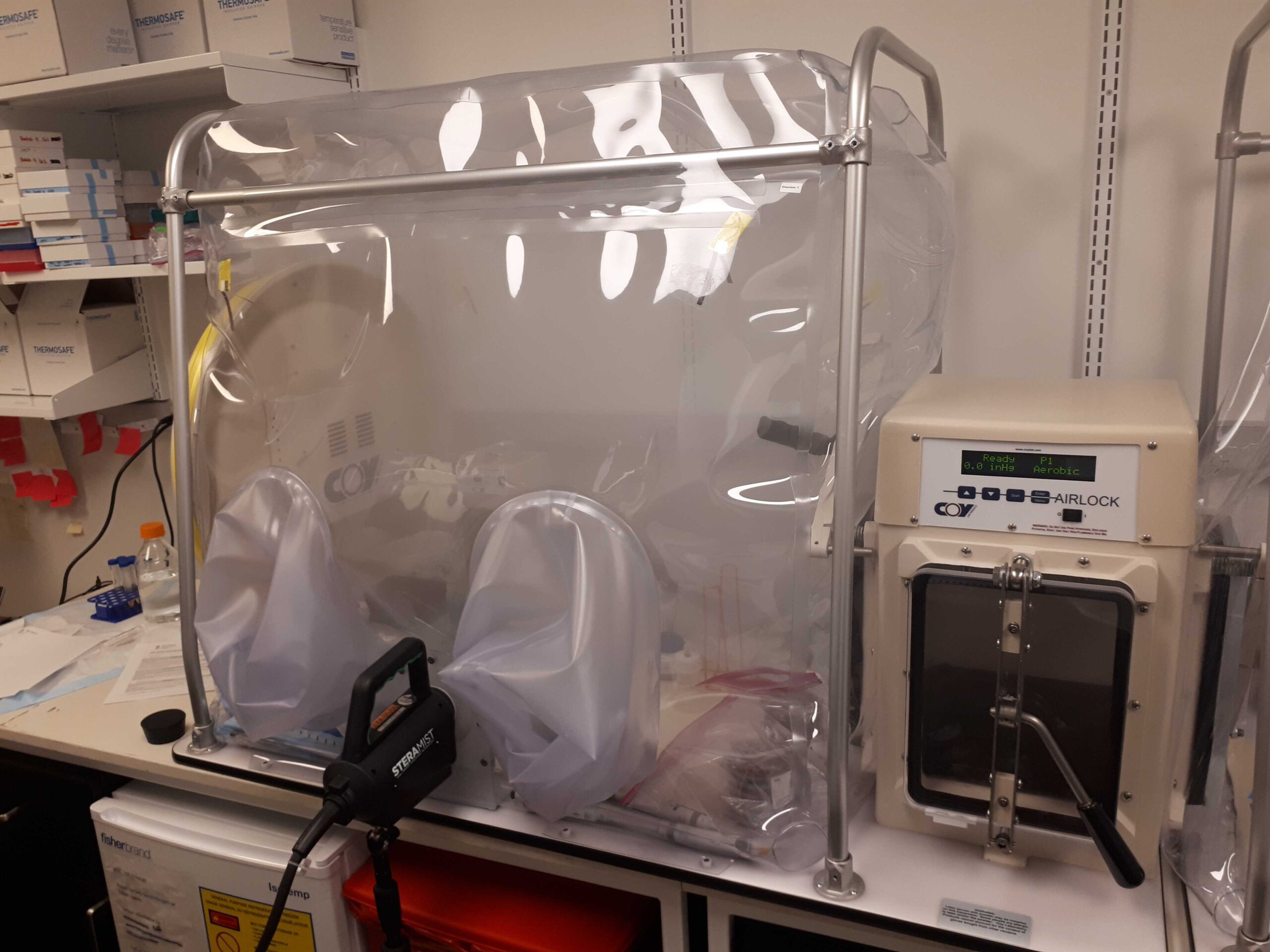 Coy anaerobic chamber showing airlock and custom decontamination port